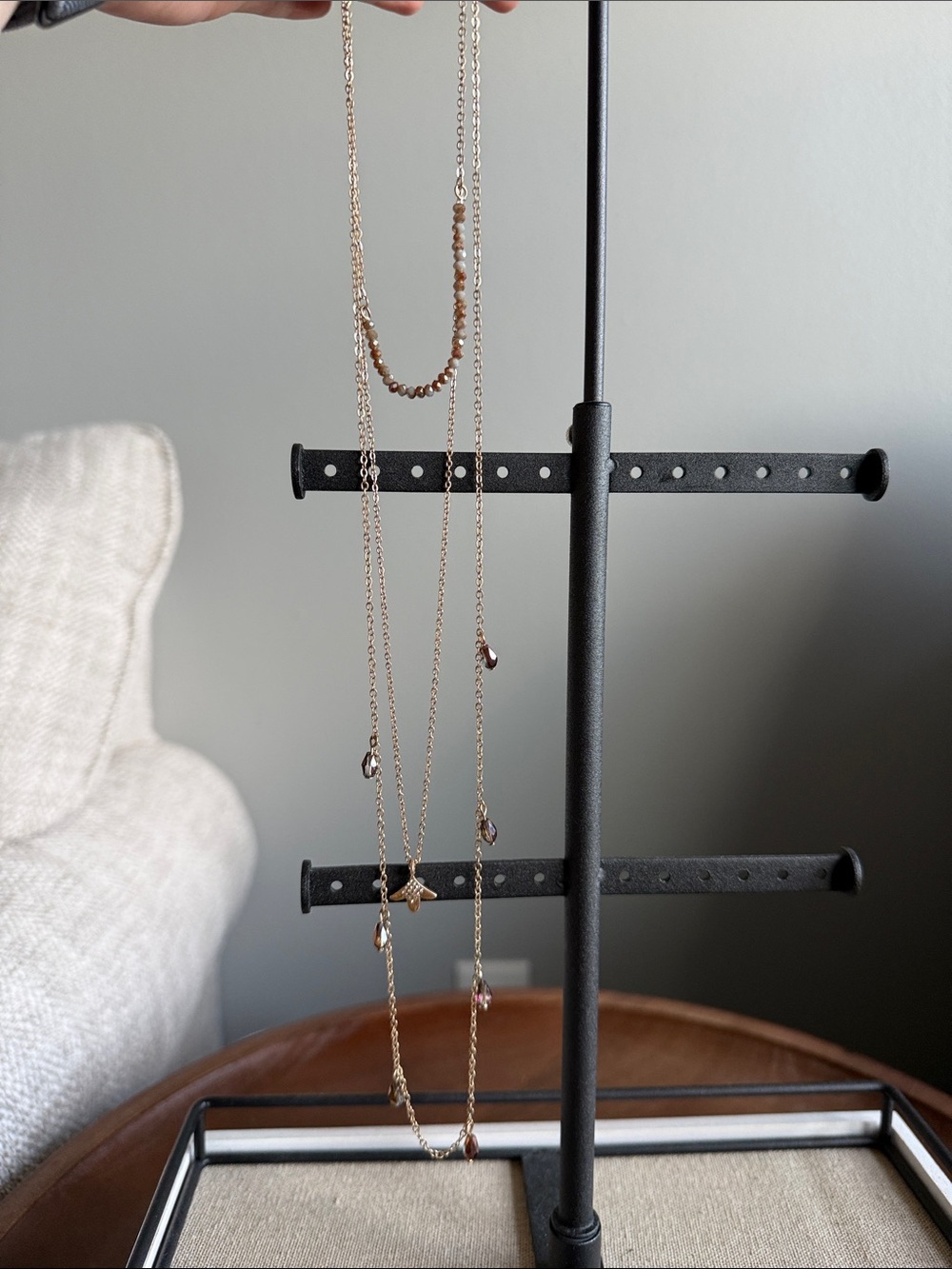 Delicate Gold Layered Necklace with Brown Bead Accents